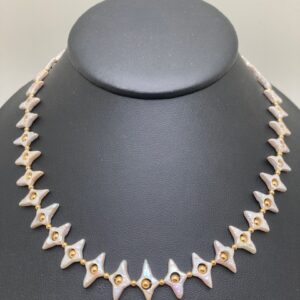 Diamond-shaped Pearl necklace and earring set.