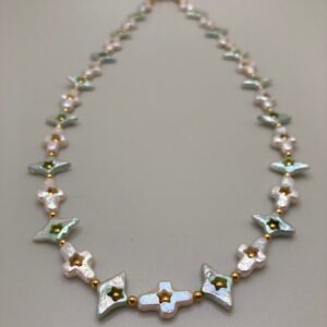 Cross and Diamond-shaped Pearl necklace and earring set.