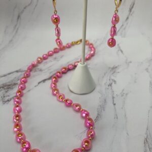 Ultrasonically drilled pink pearls with internal beads (set)