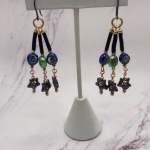 Sonic drilled colored Star Pearl dangle earrings
